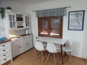 Kuchyň nebo kuchyňský kout v ubytování Casa La Piedra + 23 fotografií