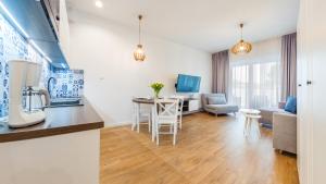 Kuchyň nebo kuchyňský kout v ubytování Sunset Resort, Sun & Snow