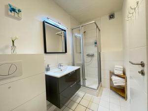 Koupelna v ubytování Hana Aparthotel
