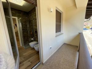 A bathroom at 021 Attico Quadrilocale, Pinzolo