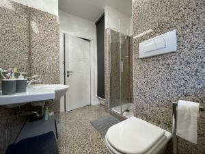 A bathroom at 021 Attico Quadrilocale, Pinzolo