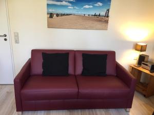 Ein Sitzbereich in der Unterkunft Ferienwohnung Sandrose