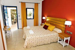 Cama ou camas em um quarto em Hotel Ca Marí