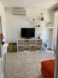 TV a/nebo společenská místnost v ubytování A'MA CASA