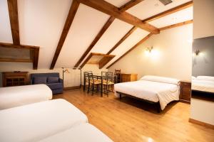 Кровать или кровати в номере Alda Casco Antiguo