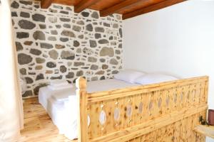 Postel nebo postele na pokoji v ubytování Volcano View Nisyros