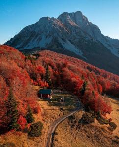 a house on a train track in a mountain at Mountain House Komovi in Andrijevica
