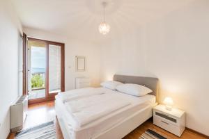Posteľ alebo postele v izbe v ubytovaní Apartments Mrs Brightside