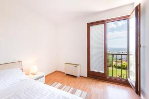 Posteľ alebo postele v izbe v ubytovaní Apartments Mrs Brightside