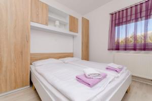 Posteľ alebo postele v izbe v ubytovaní House Christine + 19 fotografií