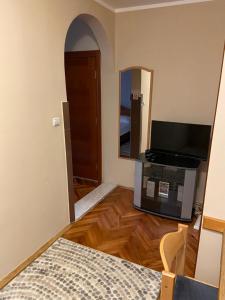 Postel nebo postele na pokoji v ubytování Apartmani Masa