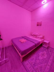Krevet ili kreveti u jedinici u objektu Pink Homestay D'Perlis