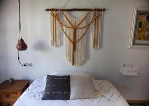 Postel nebo postele na pokoji v ubytování Casa Guidai