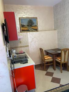 Kuchyň nebo kuchyňský kout v ubytování Apartmani Masa