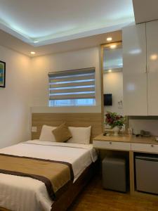 Cama o camas de una habitación en Hong Thien 1 Hotel