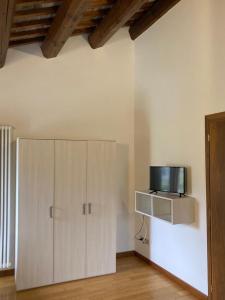 TV a/nebo společenská místnost v ubytování Agriturismo Da Andreina