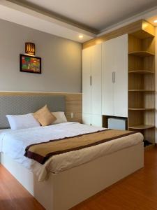 Cama o camas de una habitación en Hong Thien 1 Hotel