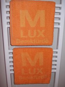 Majutusasutuses Maxilux Studio olev sertifikaat, autasu, silt või muu dokument