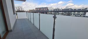 Balkón alebo terasa v ubytovaní 61 - Apartamenty Siedlce - Nowy apartament w centrum przy ul 3 Maja 51a