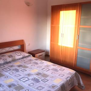 Postel nebo postele na pokoji v ubytování Veliero House
