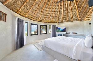 Postel nebo postele na pokoji v ubytování Maya Tulum By G Hotels