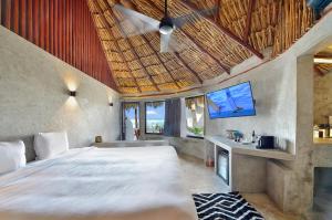 Postel nebo postele na pokoji v ubytování Maya Tulum By G Hotels