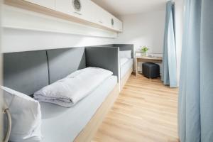 Tempat tidur susun dalam kamar di Apartmenthaus B3