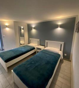 Postel nebo postele na pokoji v ubytování Aix Hotel