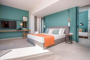 Posteľ alebo postele v izbe v ubytovaní Mazoren Art Hotel + 37 fotografií