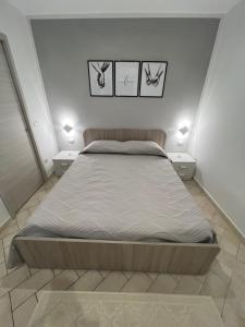Postel nebo postele na pokoji v ubytování Deus Accomodation