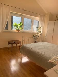 Postel nebo postele na pokoji v ubytování B&B LUCHICHI