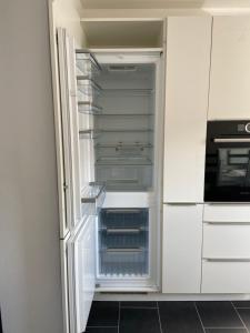 Kuchyň nebo kuchyňský kout v ubytování Apartment 13