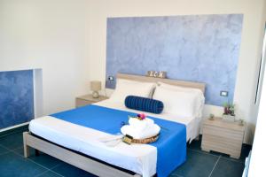Postel nebo postele na pokoji v ubytování Sperlonga Paradise Suites 500m dal mare in estate Servizio navetta per Sperlonga centro
