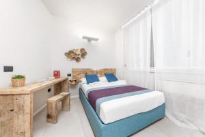 Tempat tidur dalam kamar di Casa da Suite Splendida