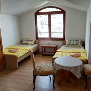 Lova arba lovos apgyvendinimo įstaigoje Apartments Mostrovi