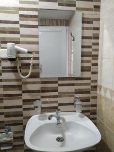 Vonios kambarys apgyvendinimo įstaigoje Apartments Mostrovi