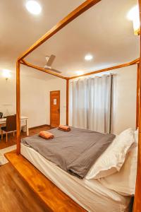 Un pat sau paturi într-o cameră la Island Zephyr