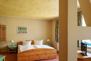 
Ein Bett oder Betten in einem Zimmer der Unterkunft Ostseehotel Neubukow
