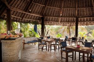 A restaurant or other place to eat at Diani Marine Divers Village