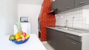 Kuchyň nebo kuchyňský kout v ubytování Villa Grace Felice