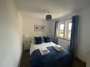 Ένα ή περισσότερα κρεβάτια σε δωμάτιο στο Little Acorn - 2-Bed Anstruther Apartment