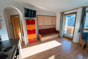 A seating area at Alpin Apartments