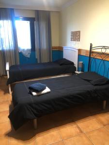 Postel nebo postele na pokoji v ubytování Corral de Jaume