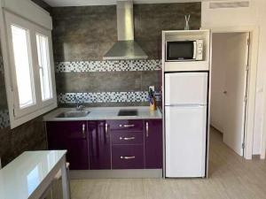 A kitchen or kitchenette at Apartamento 3 Antartico
