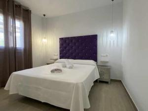 A bed or beds in a room at Apartamento 3 Antartico