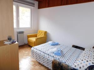 Llit o llits en una habitació de Apartman Gavro