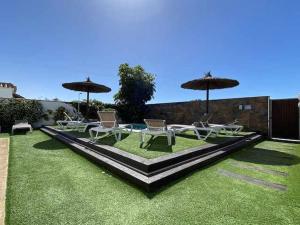 A garden outside Apartamento 3 Antartico