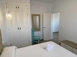 Łóżko lub łóżka w pokoju w obiekcie Apartamento 4 Atlantico