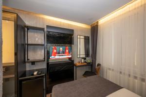 Postel nebo postele na pokoji v ubytování Continental Airport Hotel