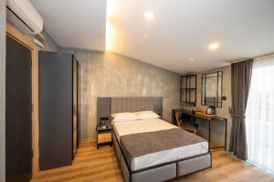 Postel nebo postele na pokoji v ubytování Continental Airport Hotel